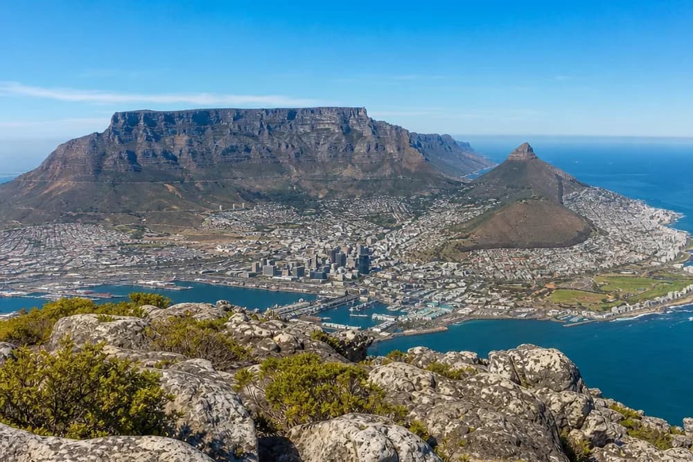 The Cape Town City Bowl seen from a high viewpoint on a clear day, Table Mountain and Lion's Head above it